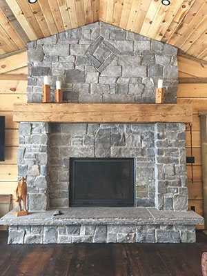 Stone fireplaces can warm up a cozy cottage