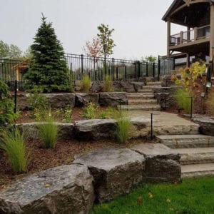 a retaining wall is a great way to help your property look finished